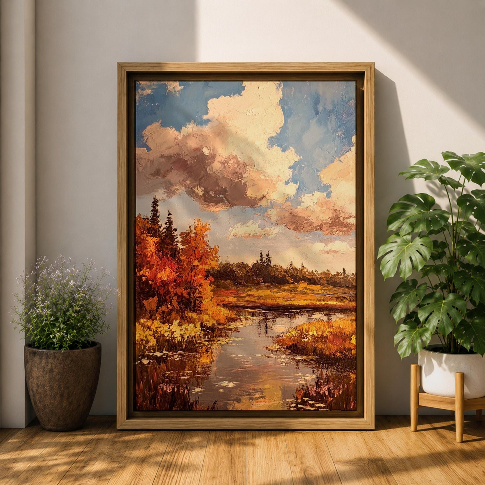 A framed impasto style painting depicting an autumn landscape with a river flowing through vibrant fall foliage and trees under a partly cloudy sky, rendered with textured brushstrokes emphasizing the rustic natural scene.