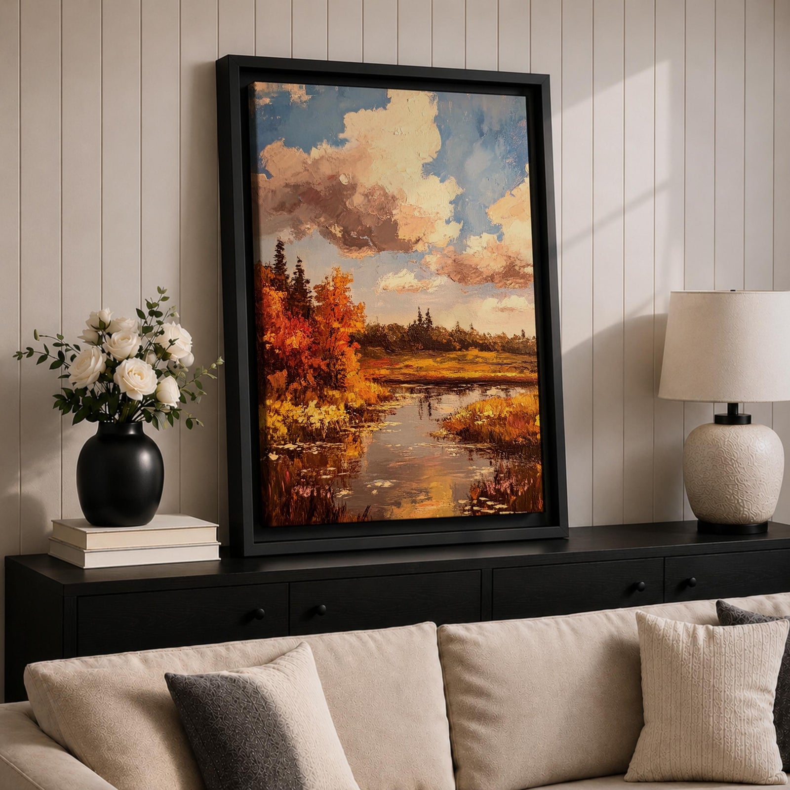 A framed impasto style painting depicting an autumn landscape with a river flowing through vibrant fall foliage and trees under a partly cloudy sky, rendered with textured brushstrokes emphasizing the rustic natural scene.