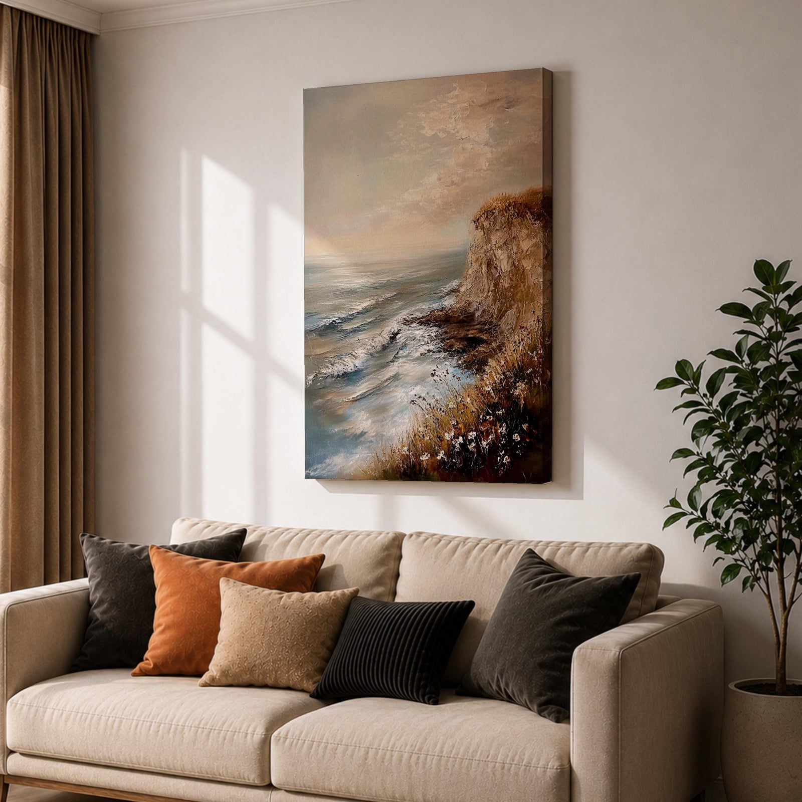 A vintage style framed canvas painting depicting a cliffside ocean seascape with waves crashing against rocky shores and wildflowers in the foreground. The textured brushwork captures the coastal landscape atmosphere with muted tones and a soft sky blending into the horizon.