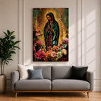 Devotional painting of Our Lady of Guadalupe standing with hands clasped in prayer, wearing a dark green star patterned mantle over a red dress and surrounded by radiant golden rays. The composition features colorful blooming flowers in the foreground framing the Virgin Mary in a vibrant painterly religious portrait.
