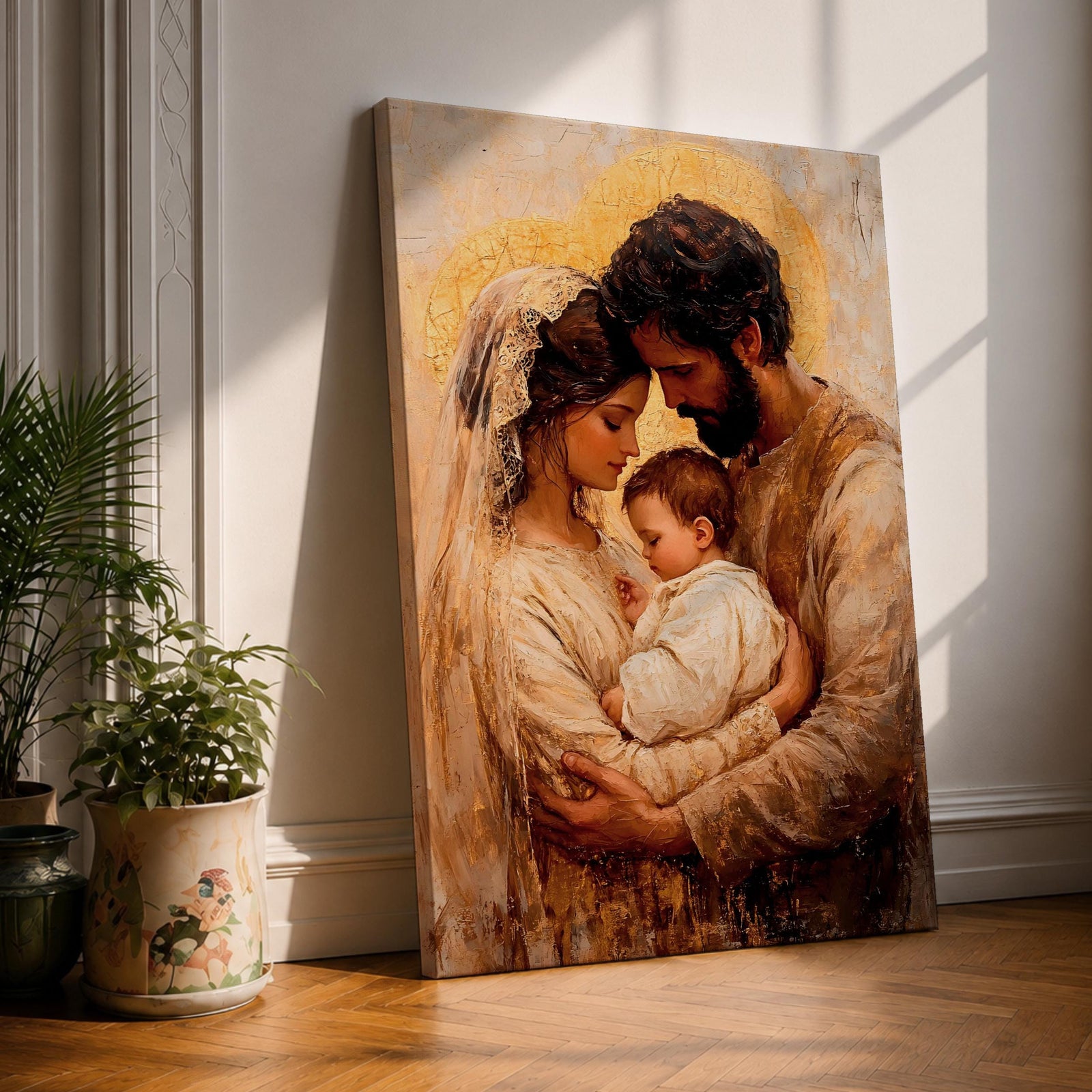 Devotional painting of the Holy Family showing Mary and Joseph gently holding baby Jesus while their heads lean together in a tender embrace. Soft golden halos glow behind the figures as warm earth tones and delicate brushwork create an intimate vintage style Christian portrait focused on the sacred family bond.