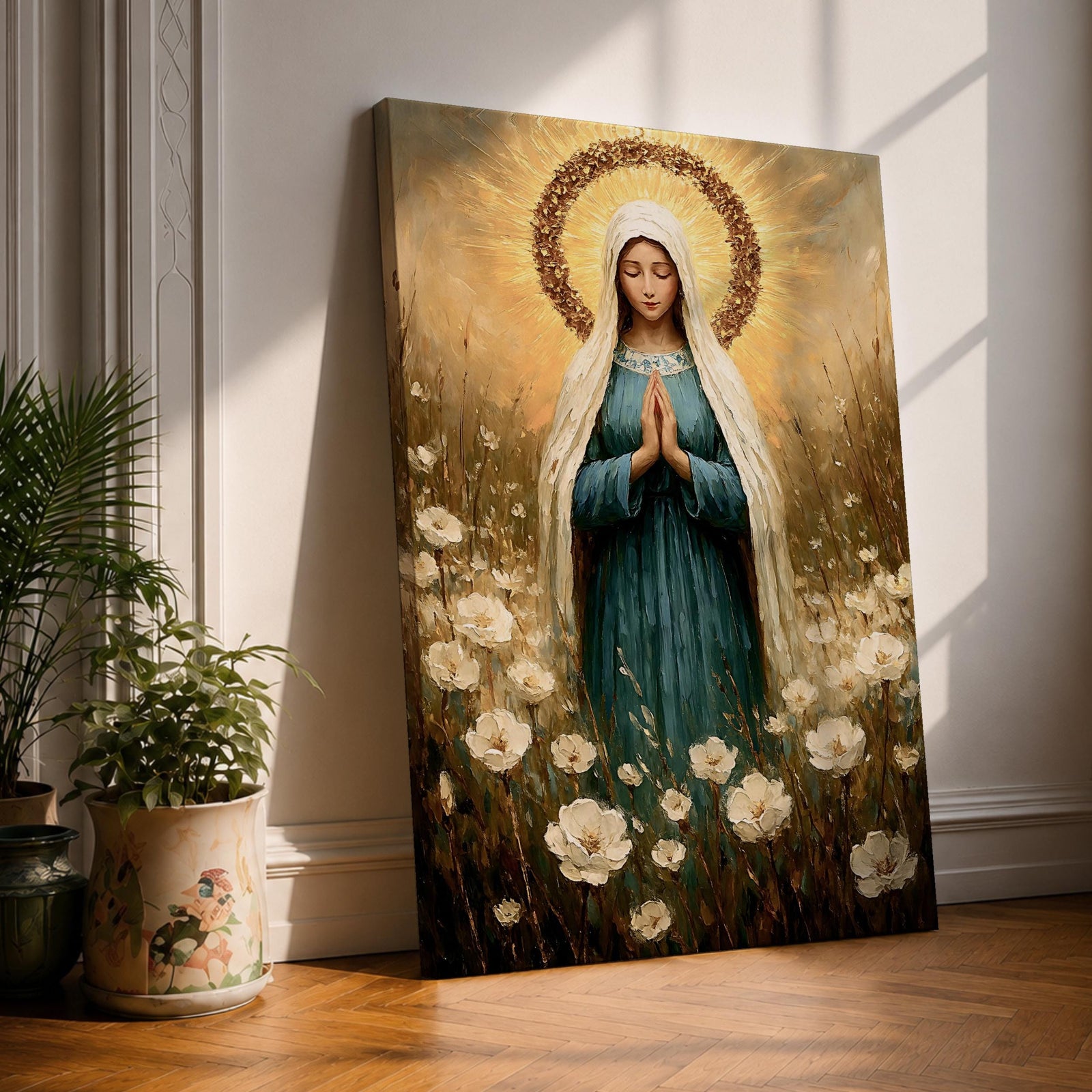 Painting of the Virgin Mary standing in prayer with hands clasped, wearing a green robe and white veil while a radiant golden halo surrounds her head. The composition shows Mary standing among soft blooming wildflowers in a peaceful field, rendered in a warm vintage devotional style with gentle brushwork and balanced portrait composition.