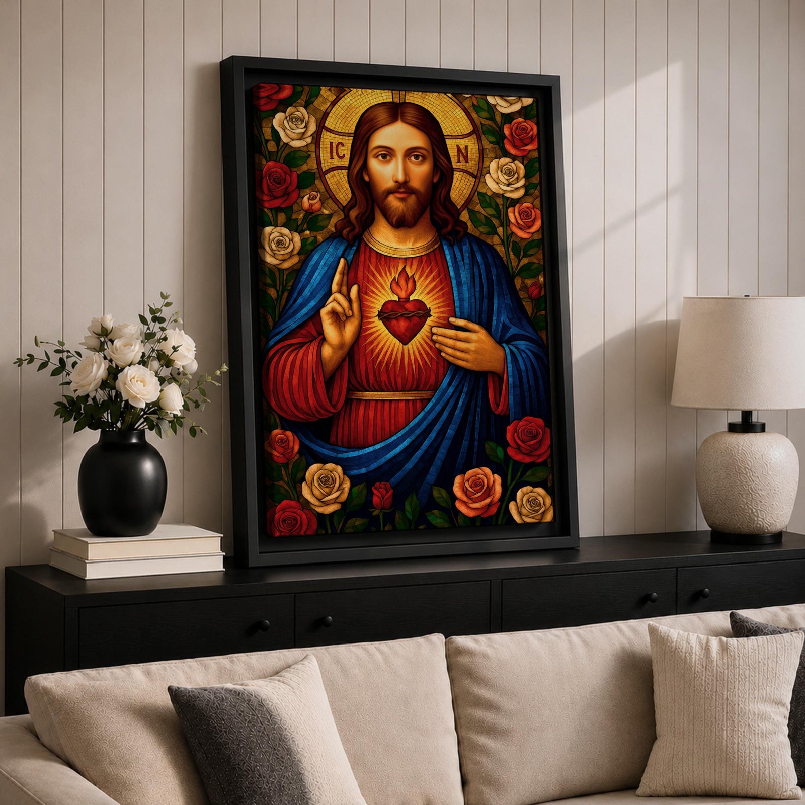 Mosaic style depiction of the Sacred Heart of Jesus showing Christ with long hair and raised blessing hand while pointing to the flaming heart on his chest, surrounded by blooming roses and decorative patterns in a stained glass inspired composition with strong symmetry and detailed religious icon imagery.