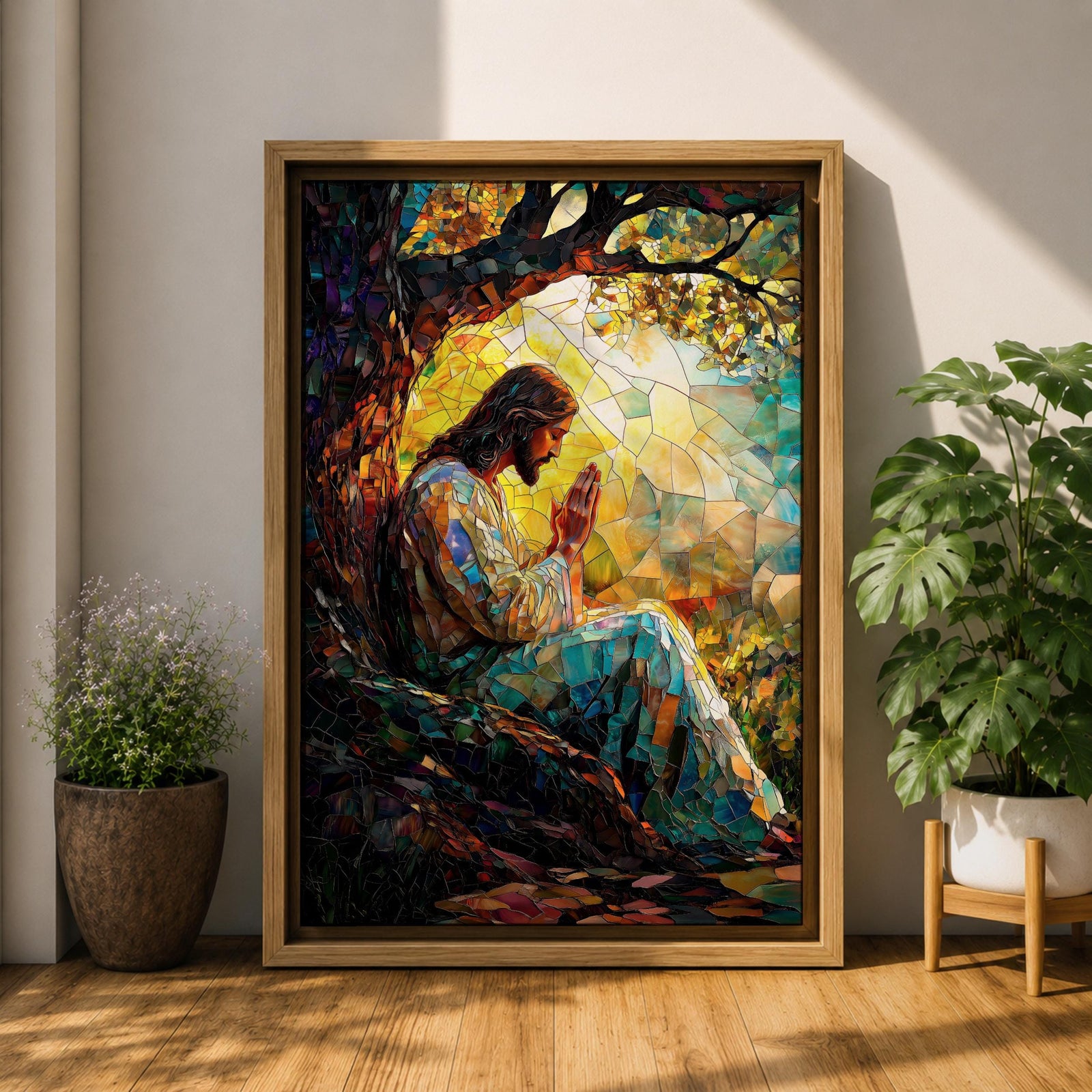 Mosaic style artwork of Jesus Christ seated beneath a large tree with hands joined in prayer, rendered in a stained glass inspired composition with colorful tessellated pieces forming his robe, the tree branches, and a glowing sunrise behind him, creating a devotional Christian scene with strong light and intricate mosaic detailing.
