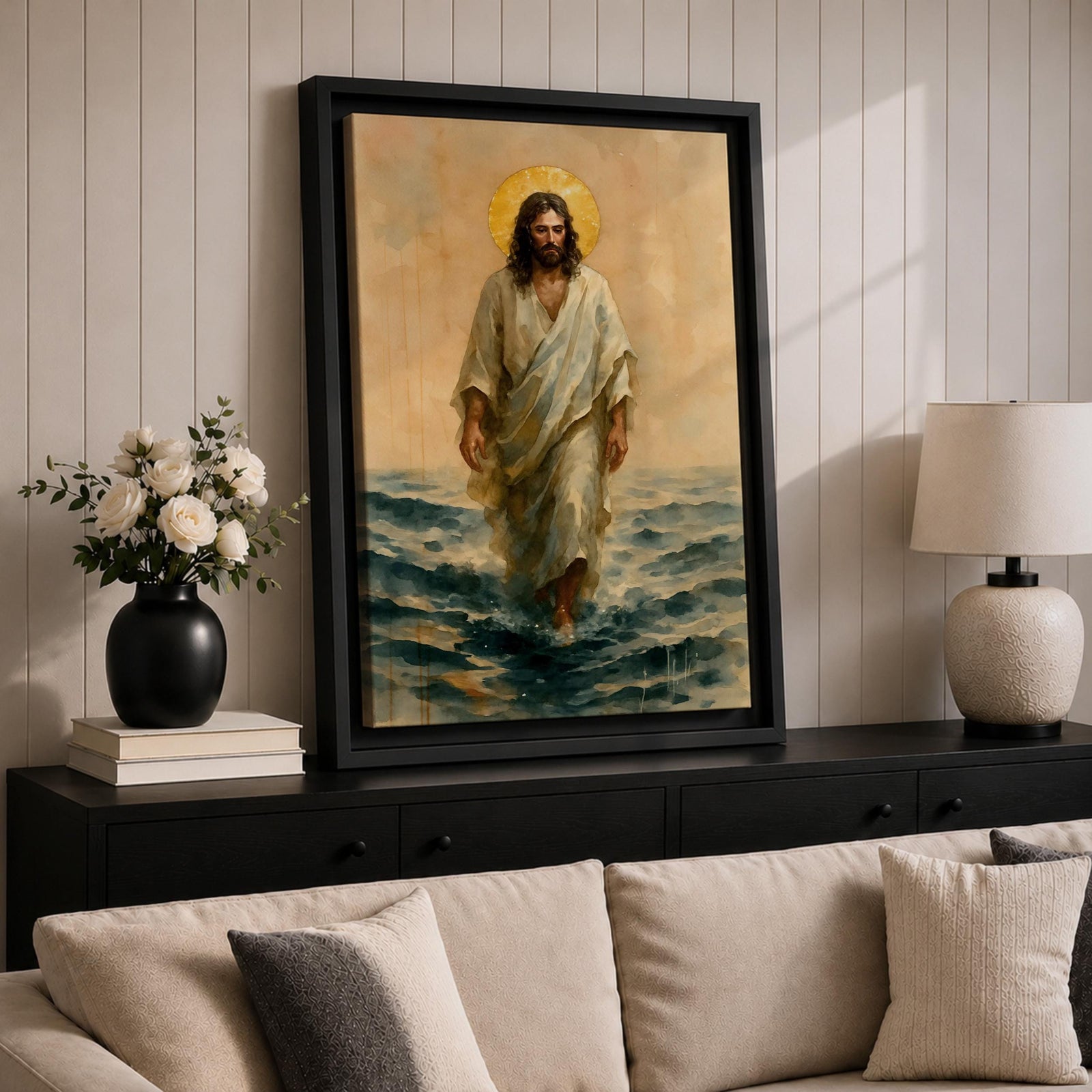 A watercolor style framed canvas depicting Jesus walking on water with a golden halo behind his head. The figure is dressed in flowing robes, stepping across waves with a serene expression. The artwork captures a biblical scene with soft, natural tones and detailed brushwork emphasizing movement and faith.