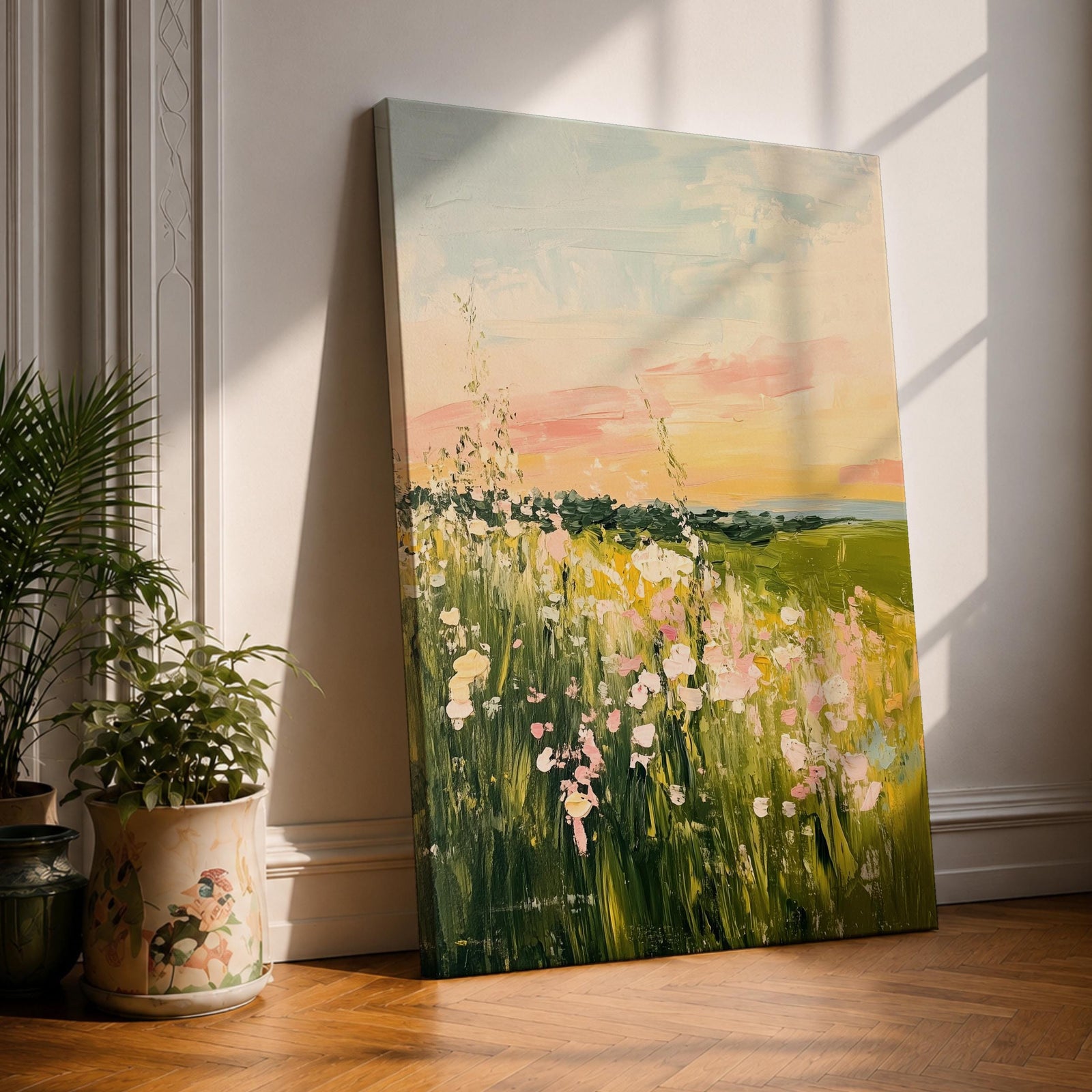 An impressionistic vintage style framed canvas painting depicting a meadow landscape with wildflowers and grasses under a soft sky, rendered with textured brushstrokes and warm tones, capturing the natural beauty of a rustic botanical field scene.