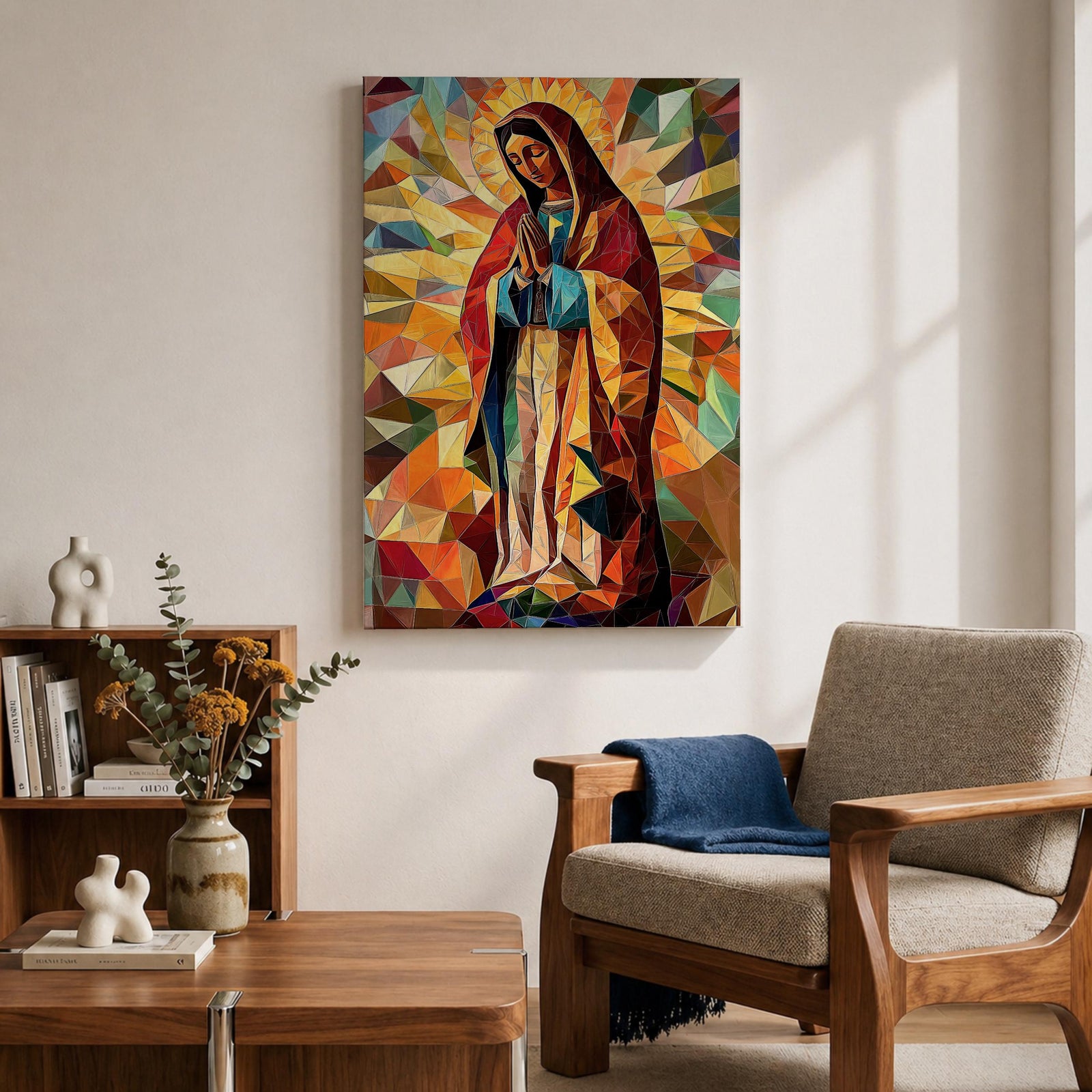 Geometric mosaic style depiction of Our Lady of Guadalupe shown standing in prayer with hands joined, surrounded by radiant golden halo rays and colorful angular shapes forming a stained glass inspired composition that highlights the Virgin Mary in a modern geometric Catholic devotional design.