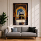 Artwork depicting the Kaaba in Masjid Al Haram in Mecca viewed through an ornate golden mosque arch, with two tall minarets rising behind the sacred courtyard and birds flying across a bright blue sky.