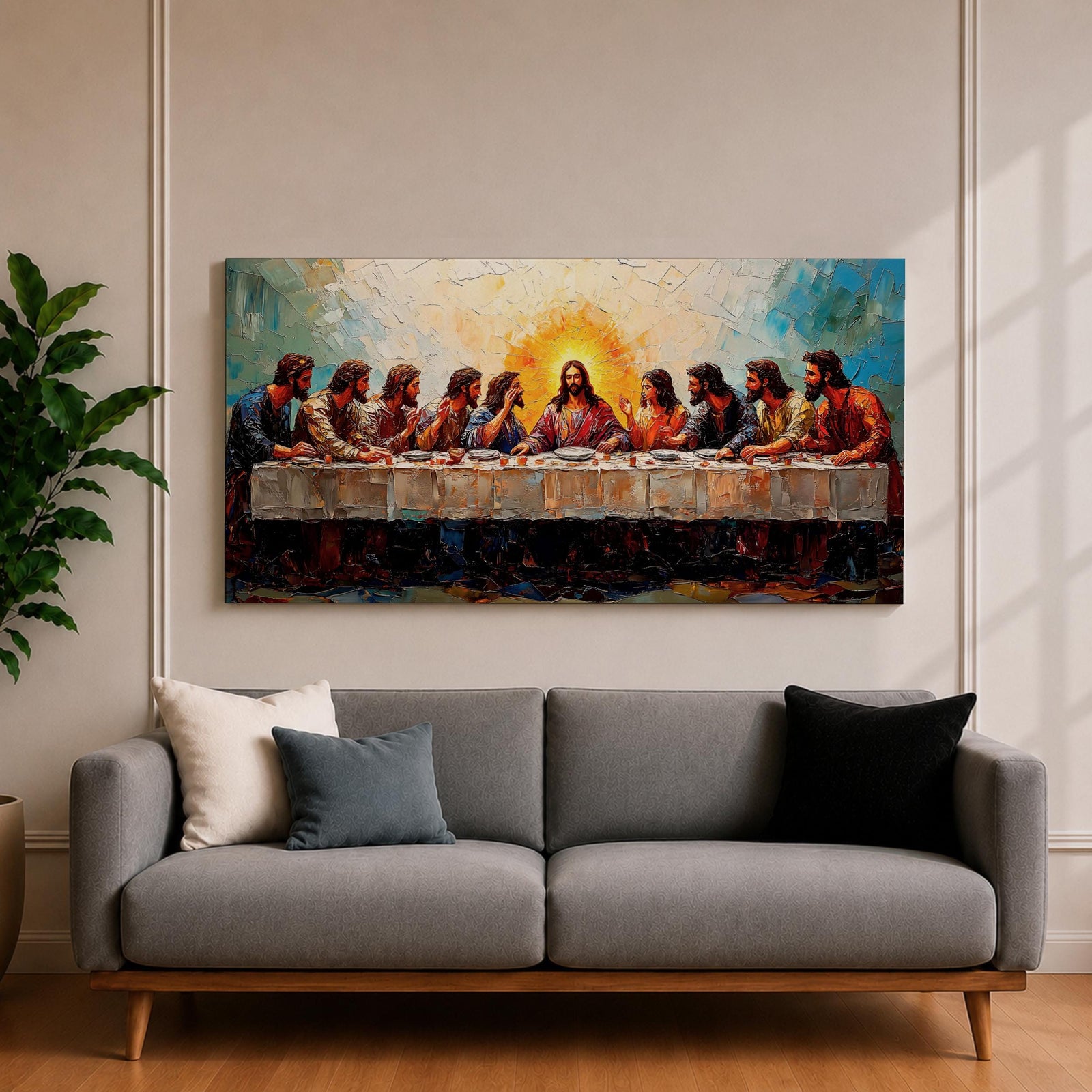 Panoramic painting of Jesus and the twelve apostles at the Last Supper gathered around a long table beneath radiant light.
