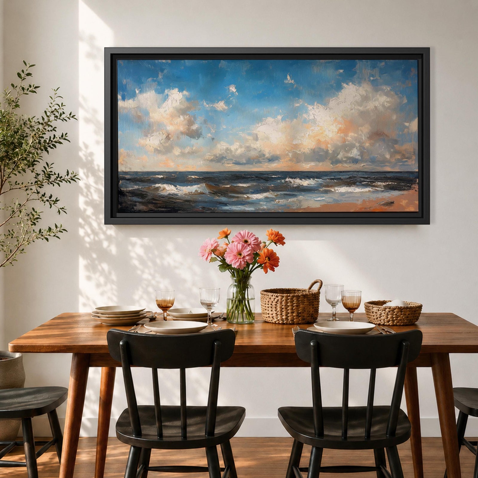 A panoramic seascape painting showing rolling ocean waves moving toward a sandy shoreline beneath a wide sky filled with soft clouds and warm light. The composition stretches across the horizon with textured brushstrokes capturing movement in the water and subtle reflections of blue, white and golden tones across the sea.