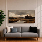 A panoramic countryside river landscape painting featuring a calm winding stream flowing through open rural fields with tall golden grasses and a distant farmhouse near a cluster of dark trees beneath a dramatic cloudy sky. The scene uses earthy browns and muted greens with soft painterly brushstrokes capturing a quiet pastoral prairie setting.