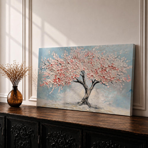 Panoramic textured painting of a cherry blossom tree with a twisting dark trunk and a wide canopy of soft pink blossoms spreading across a pale blue sky. Thick palette knife strokes create layered petals and raised textures, forming a calm spring landscape with delicate floral clusters and gentle pastel tones.