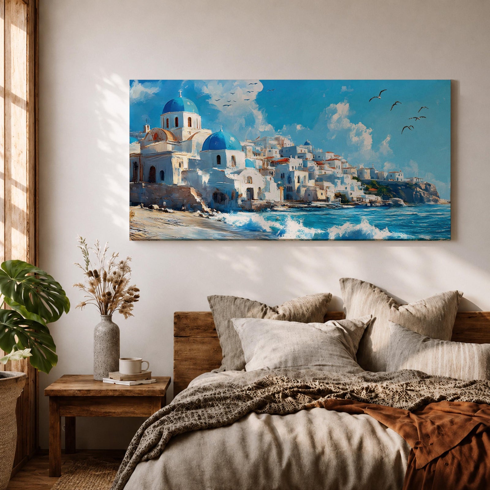 Panoramic painting of Santorini’s coastal village with whitewashed houses and blue domed churches overlooking the Aegean Sea. Waves crash along the shoreline beneath sunlit buildings stacked across the hillside, while seabirds glide through a bright blue sky with soft clouds above the Mediterranean landscape.