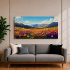 Panoramic painting of a vibrant mountain meadow filled with colorful wildflowers stretching toward distant alpine peaks. Red, yellow, purple, and blue blossoms cover the valley floor beneath a bright sky with soft clouds, while layered mountains rise along the horizon in a luminous natural landscape.