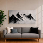 Panoramic black and white painting of alpine peaks with dramatic snowy mountains rising through mist and clouds. Thick textured brushstrokes create strong contrast between dark rocky ridges and bright snowfields, forming a minimalist monochrome mountain landscape stretching across a wide composition.