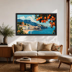 Panoramic painting of the Amalfi Coast with white seaside buildings and a domed church overlooking bright turquoise Mediterranean waters. Lemon branches heavy with citrus fruit frame the scene while mountains rise behind the coastal village beneath a blue sky with scattered clouds.