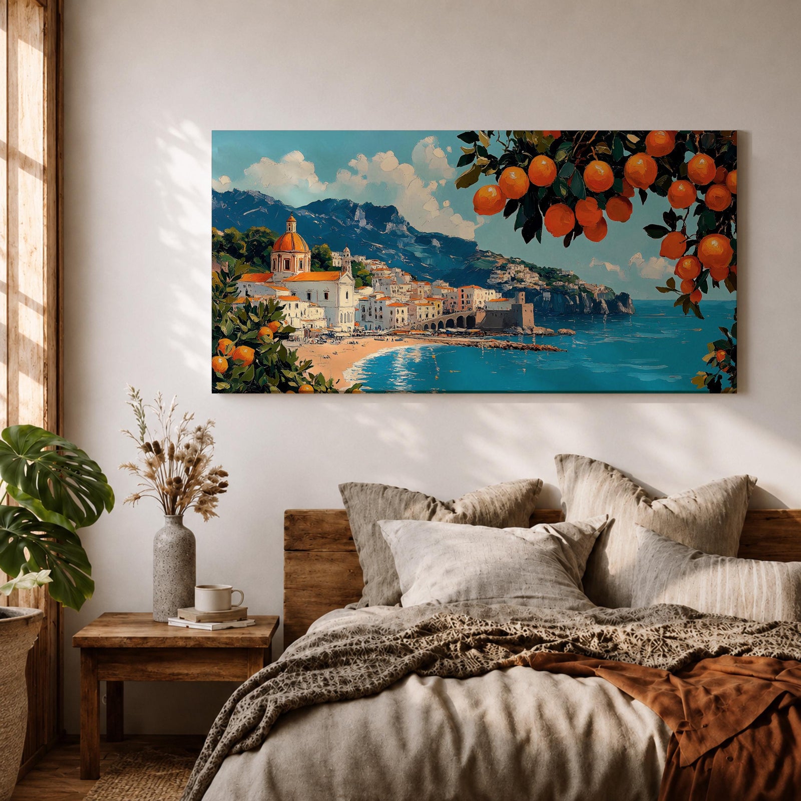 Panoramic painting of the Amalfi Coast with white seaside buildings and a domed church overlooking bright turquoise Mediterranean waters. Lemon branches heavy with citrus fruit frame the scene while mountains rise behind the coastal village beneath a blue sky with scattered clouds.