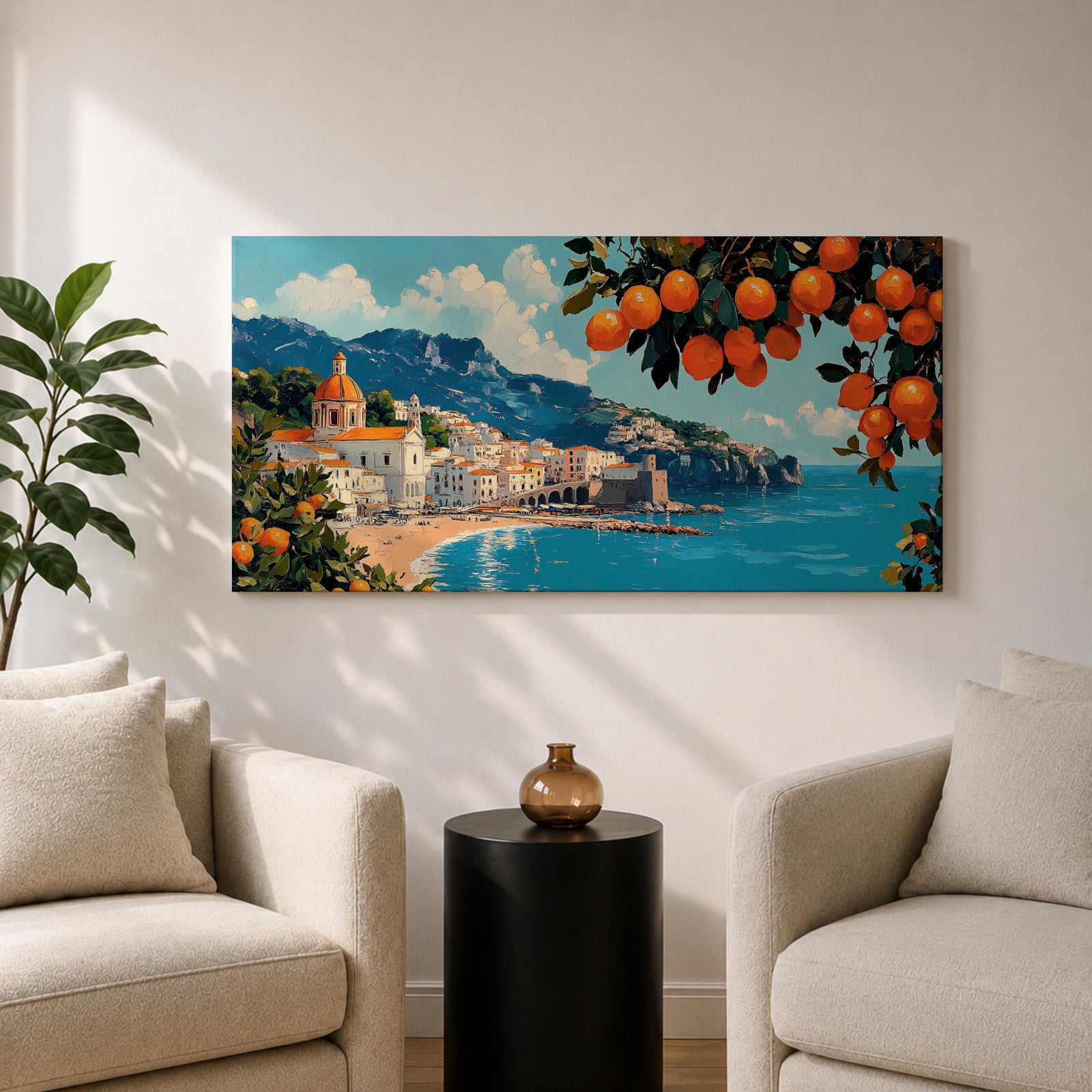 Panoramic painting of the Amalfi Coast with white seaside buildings and a domed church overlooking bright turquoise Mediterranean waters. Lemon branches heavy with citrus fruit frame the scene while mountains rise behind the coastal village beneath a blue sky with scattered clouds.