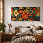 Panoramic illustration of a dense floral garden pattern filled with layered blossoms and detailed leaves. Large red, orange, yellow, and cream flowers spread across a dark background while teal foliage and curling botanical stems create an intricate decorative composition of overlapping garden blooms.