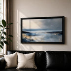 Panoramic abstract coastal seascape painting featuring a calm ocean shoreline with soft blue, gray, and sandy tones reflecting across the water beneath a cloudy horizon.