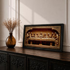 Panoramic relief artwork depicting the Last Supper with Jesus Christ seated at the center surrounded by the twelve apostles at a long table. The carved scene features classical biblical figures gathered in a detailed architectural setting.