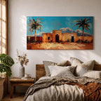 Panoramic painting of a Moroccan kasbah surrounded by palm trees in a desert oasis with the Atlas Mountains rising in the distance. The warm earthen architecture contrasts with a bright blue sky and textured brushstrokes capturing North African landscape scenery.