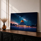 Panoramic night scene of the Dome of the Rock mosque in Jerusalem illuminated beneath a star filled sky and Milky Way galaxy. The golden dome reflects soft light across the courtyard while the historic Islamic architecture stands against the deep blue night horizon.