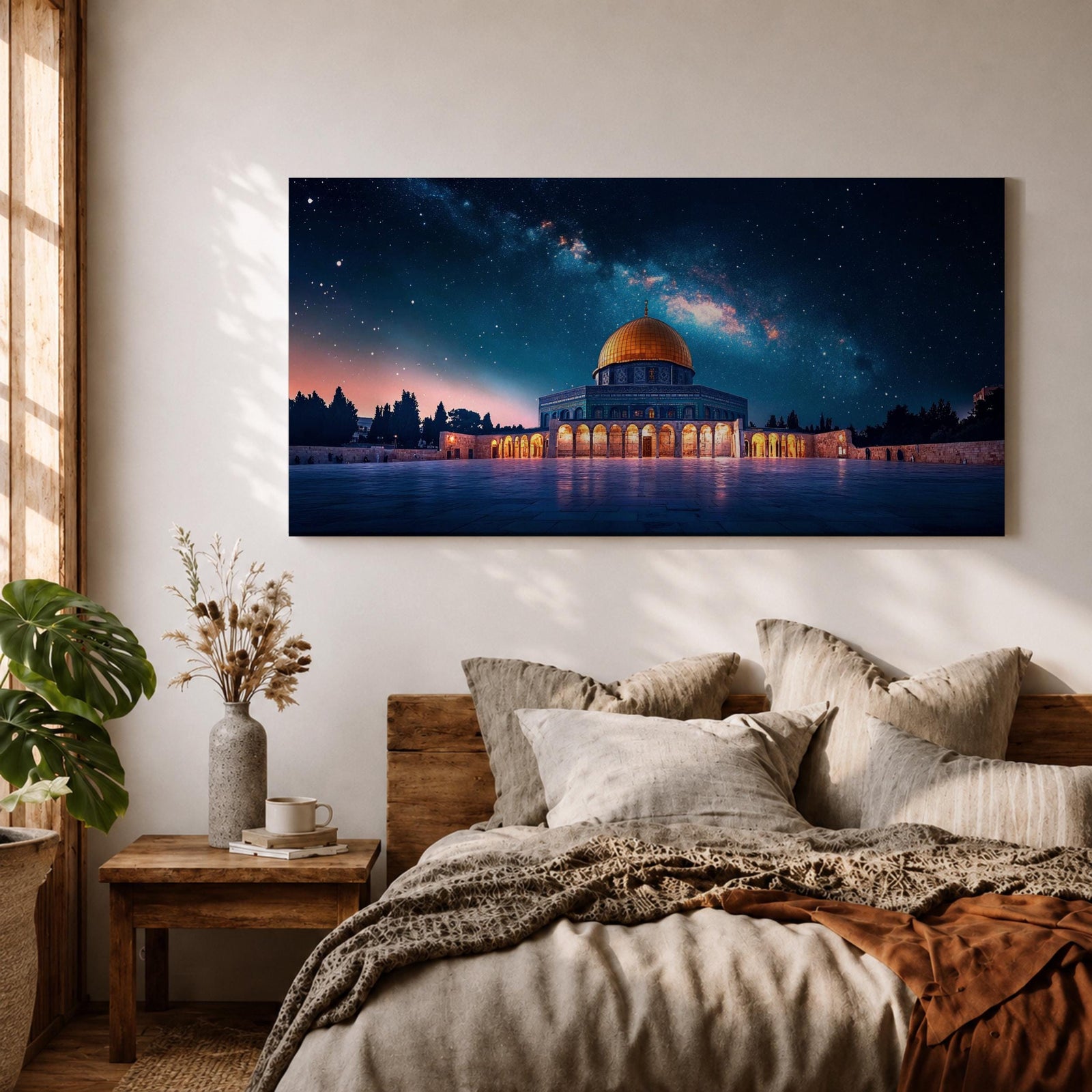 Panoramic night scene of the Dome of the Rock mosque in Jerusalem illuminated beneath a star filled sky and Milky Way galaxy. The golden dome reflects soft light across the courtyard while the historic Islamic architecture stands against the deep blue night horizon.
