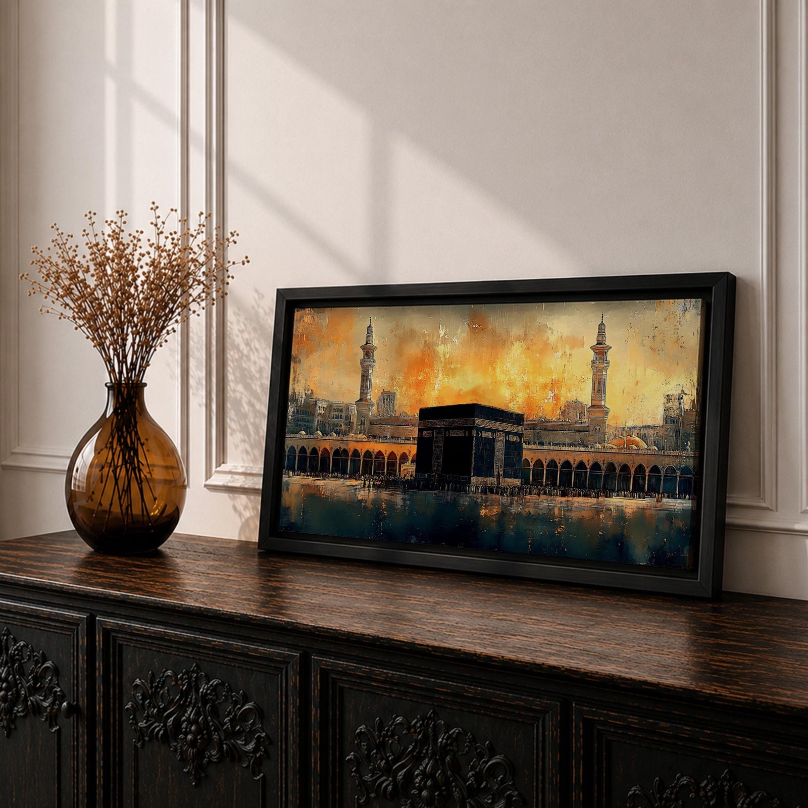 Panoramic painting of the Kaaba at Masjid al Haram in Mecca surrounded by mosque arches and minarets under a glowing golden sky
