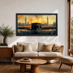 Panoramic painting of the Kaaba at Masjid al Haram in Mecca surrounded by mosque arches and minarets under a glowing golden sky