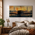 Panoramic painting of the Kaaba at Masjid al Haram in Mecca surrounded by mosque arches and minarets under a glowing golden sky