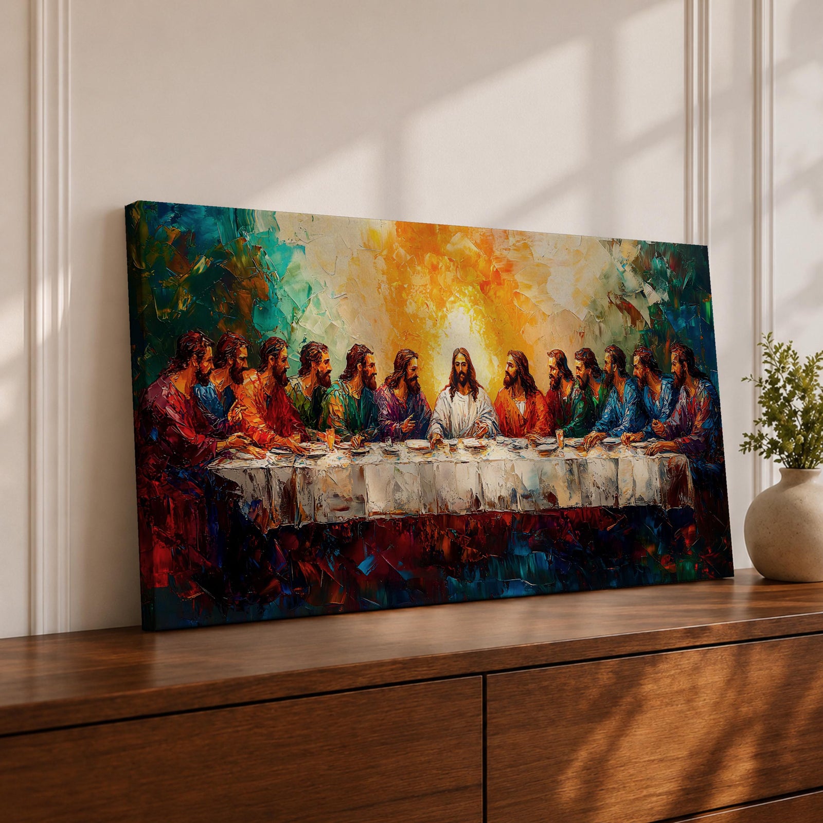 Panoramic painting of the Last Supper featuring Jesus and the twelve apostles gathered around a long table illuminated by a radiant golden light in a colorful expressive style.