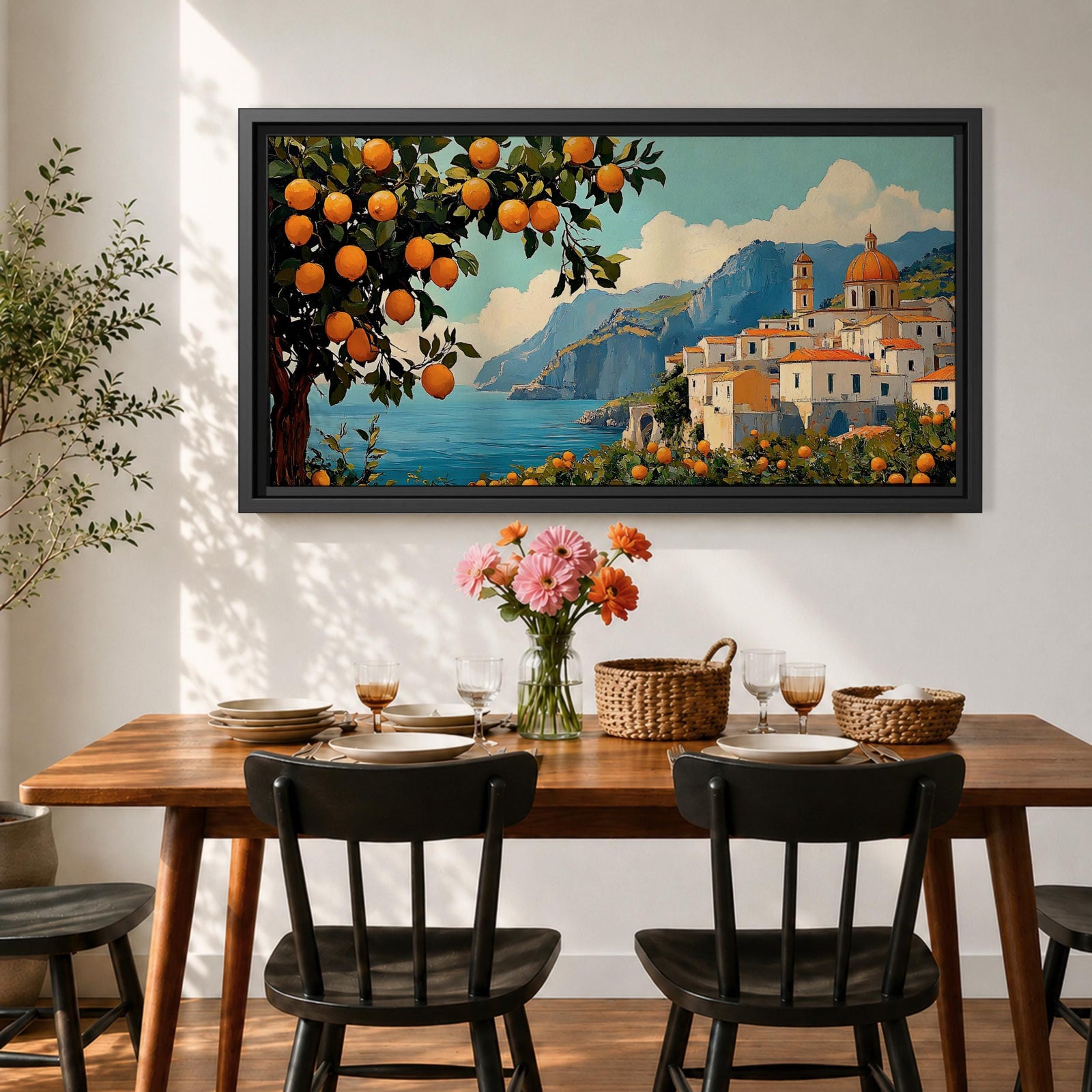 Panoramic coastal artwork showing a Mediterranean village overlooking the sea with white buildings and a domed church set against blue mountains. In the foreground a large lemon tree heavy with bright citrus fruit frames the scene while additional lemons and greenery fill the lower landscape, creating a vibrant Amalfi Coast inspired composition.