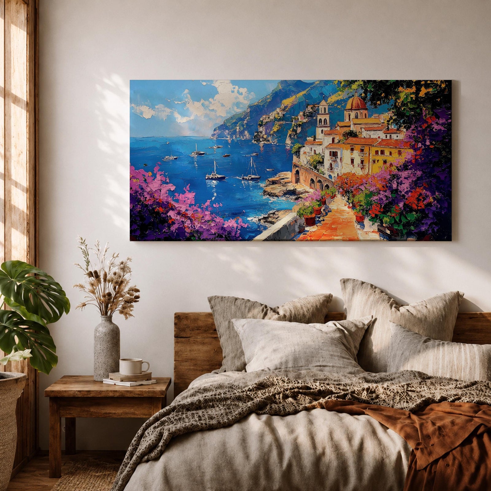 Panoramic painting of the Amalfi Coast featuring a colorful seaside village perched above deep blue Mediterranean water. Boats float across the bay while a stone path lined with blooming bougainvillea leads toward warm sunlit buildings and a domed church, with dramatic coastal cliffs and mountains rising in the distance.