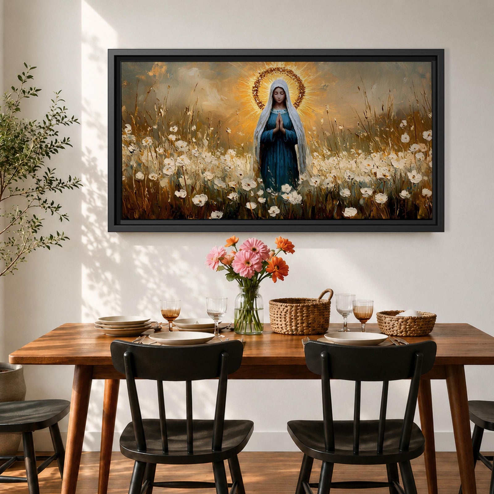 Panoramic painting depicting the Virgin Mary standing in a field of white flowers with hands gently clasped in prayer. A radiant golden halo surrounds her head while warm light fills the sky behind her, and soft brushstrokes capture flowing robes and delicate blossoms across the landscape.