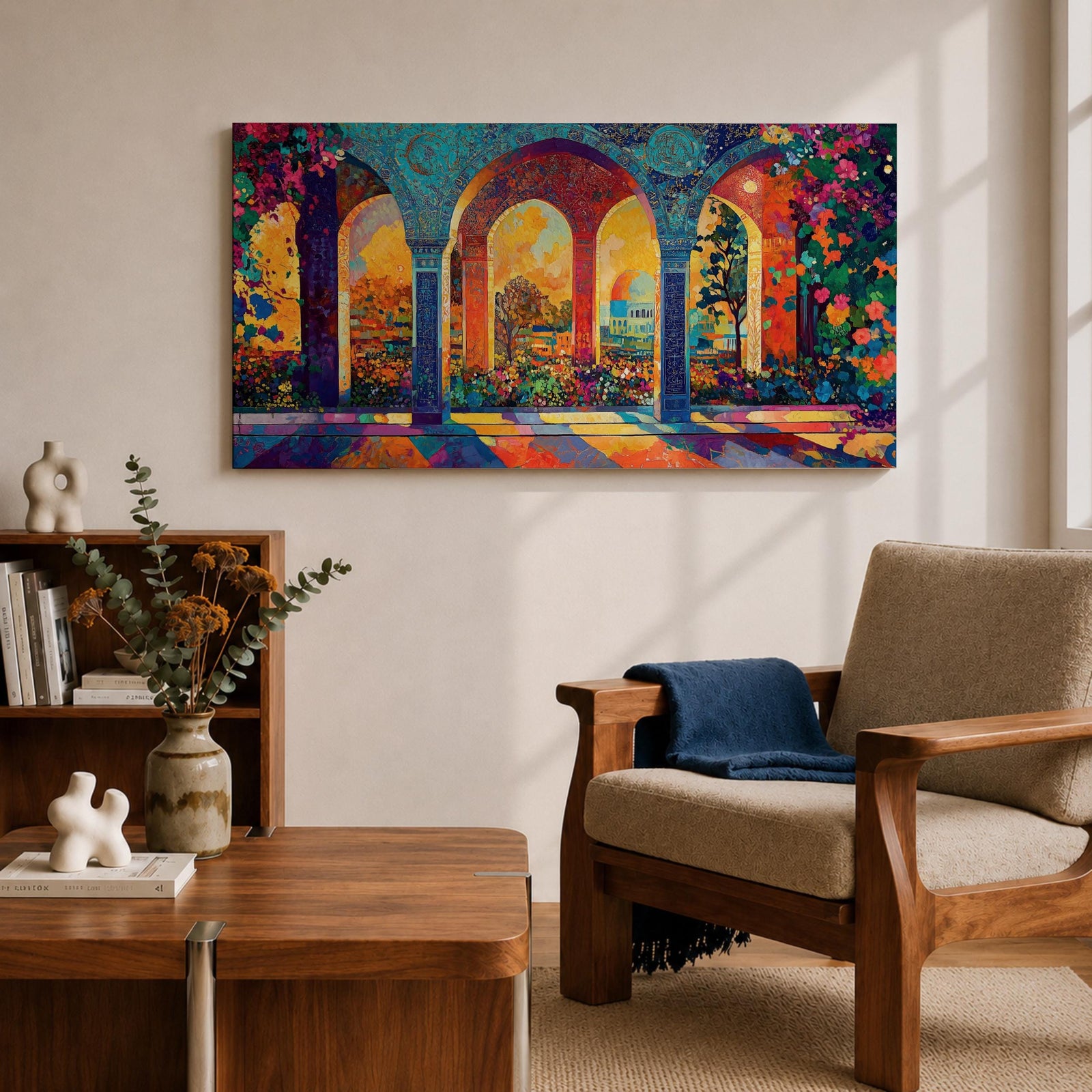 Panoramic artwork depicting ornate Moorish arches opening into a vibrant garden courtyard filled with colorful flowers and trees. Decorative tiled columns frame the arches while warm sunlight streams through, casting multicolored reflections across the floor and highlighting the detailed Islamic architectural patterns.