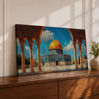 Panoramic artwork depicting the Dome of the Rock with its golden dome rising above blue tiled walls and stone courtyard. The mosque is framed by tall historic arches and columns in the foreground while bright blue sky and soft clouds highlight the iconic Jerusalem Islamic landmark.