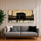 Panoramic artwork depicting the Kaaba at the center of Masjid Al Haram in Mecca surrounded by the mosque’s arcades and tall minarets. Pilgrims gather around the Kaaba across the bright courtyard floor while the dark cubic structure contrasts against the warm sky and detailed mosque architecture.