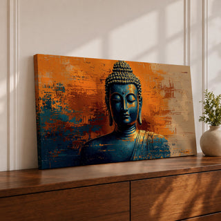 Panoramic artwork depicting a serene Buddha portrait with closed eyes and calm expression against a textured abstract background. Deep blue tones define the figure while bold orange and gold brushstrokes create contrast around the head and shoulders, emphasizing a tranquil meditative presence.