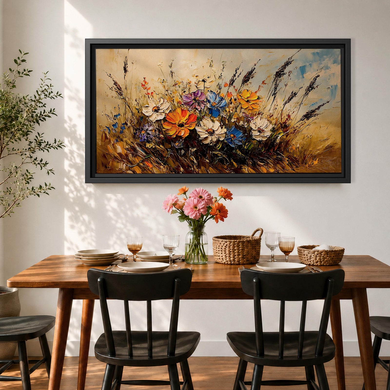 Panoramic painting depicting a vibrant cluster of wildflowers growing through tall meadow grasses. Bright blossoms in orange, blue, purple, and white rise from textured golden stems while loose expressive brushstrokes create movement across the floral arrangement and surrounding field.