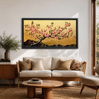 A panoramic painting of a flowering cherry blossom branch extending across the composition with clusters of soft pink sakura flowers and dark textured bark, set against a rich gold background with distant mountain silhouettes, rendered in a Japanese inspired style with detailed petals and balanced horizontal composition.