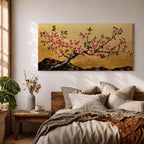 A panoramic painting of a flowering cherry blossom branch extending across the composition with clusters of soft pink sakura flowers and dark textured bark, set against a rich gold background with distant mountain silhouettes, rendered in a Japanese inspired style with detailed petals and balanced horizontal composition.