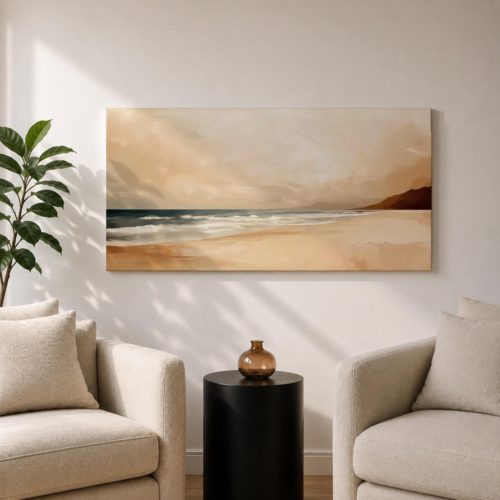 Panoramic coastal landscape painting showing a quiet sandy beach with gentle ocean waves rolling onto the shore beneath a soft sky. Subtle tones of beige, blue, and warm gray create a calm atmosphere while distant hills stretch along the horizon and light reflects across the water.