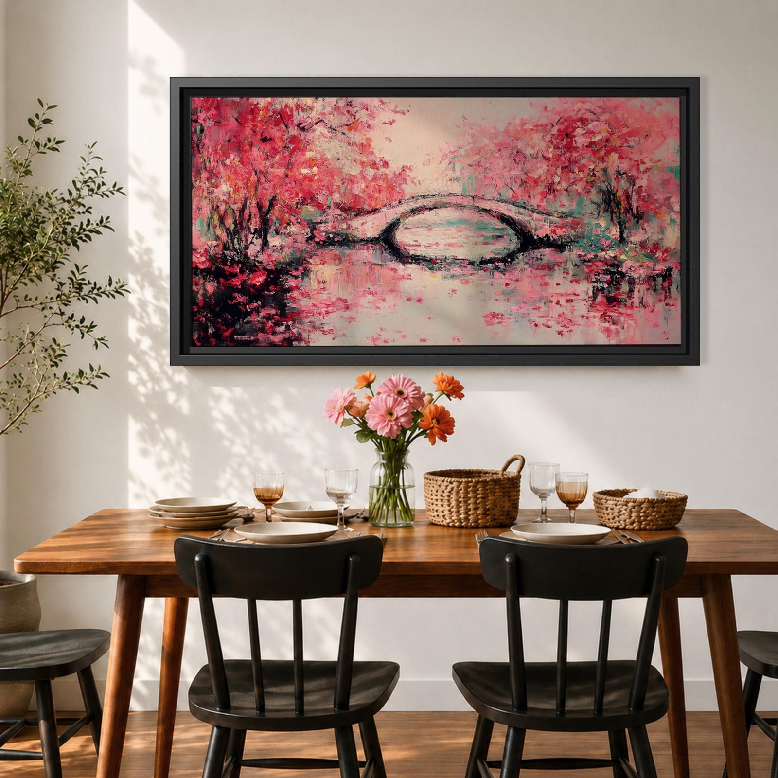 Panoramic painting of blooming cherry blossom trees with soft pink petals surrounding a curved bridge over calm water during spring. Layers of textured brushstrokes form clusters of blossoms drifting across the scene while reflections shimmer on the surface creating a wide Japanese inspired spring landscape composition.