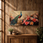 Panoramic painting of a vibrant peacock standing among blooming pink and coral peony flowers with its long iridescent tail cascading across the composition. Thick palette knife brushstrokes form layered petals textured foliage and detailed feather eyes creating a wide horizontal floral bird scene with rich color contrast.