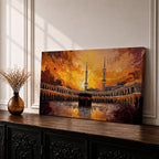 Panoramic impressionist painting of the Kaaba at Masjid al Haram in Mecca with the black cube sanctuary centered within the mosque courtyard. Tall minarets rise above surrounding arcades while dramatic golden sunset skies and expressive brushstrokes fill the wide horizontal composition with warm light and movement.