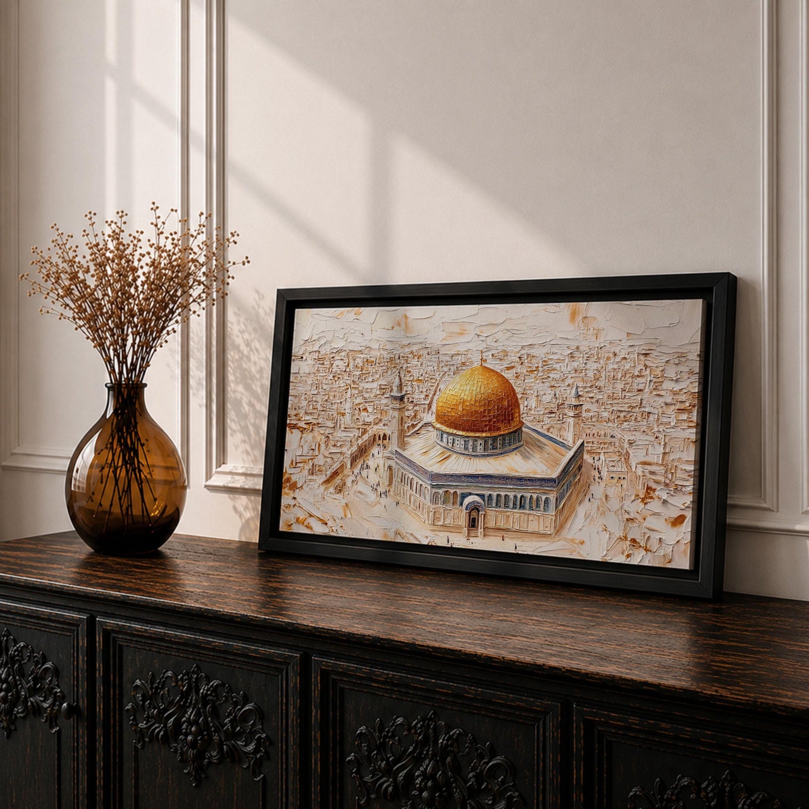Panoramic textured painting of the Dome of the Rock in Jerusalem featuring the large golden dome rising above the octagonal shrine with blue and stone architectural details. The surrounding Jerusalem cityscape spreads across the background in layered neutral tones while small figures and pathways create depth in the wide horizontal composition.