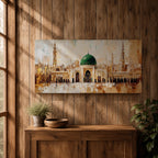 Panoramic painting of Al Masjid an Nabawi in Medina featuring the iconic green dome centered among ornate mosque architecture and tall minarets rising against a warm textured skyline. Thick palette knife strokes form arches domes and city structures creating a wide horizontal Islamic architectural scene with layered gold beige and green tones.