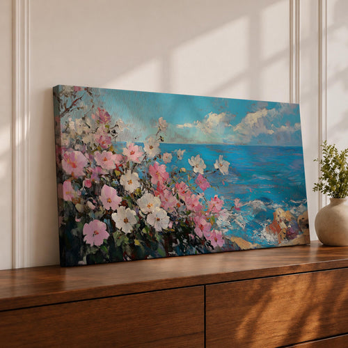 Panoramic painting of pink and white cosmos flowers blooming along a coastal cliff with vibrant blue ocean waves stretching toward the horizon beneath soft clouds. Thick palette knife brushstrokes create textured petals foliage and rocky shoreline forming a wide horizontal seaside landscape filled with bright floral color and movement.