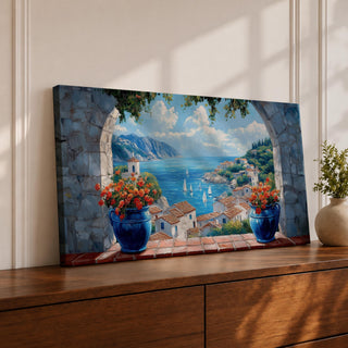 A panoramic painting of a Mediterranean seaside village viewed through a stone arch window, featuring blue ocean waters, sailboats, terracotta rooftops, and vibrant floral pots.